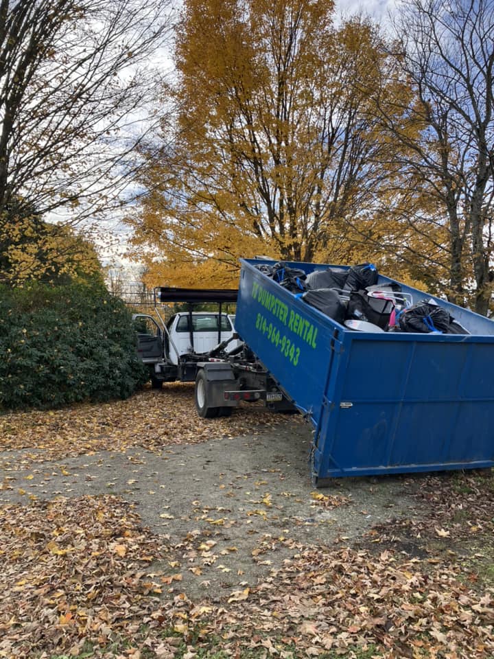 Dumpster hauled in snowy weather